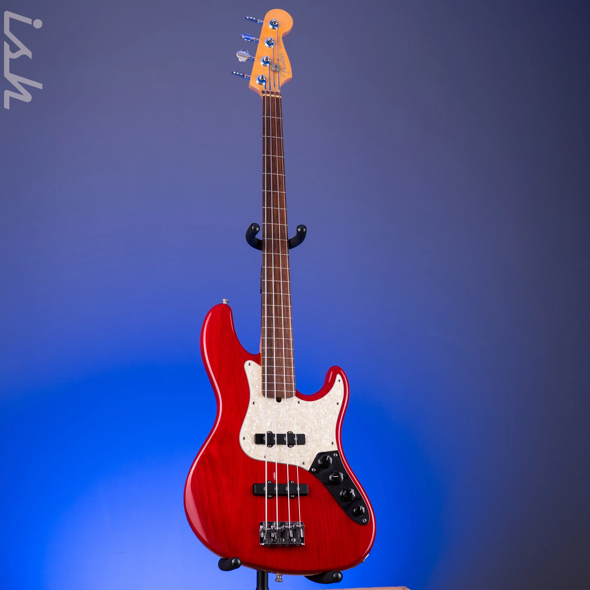 1999 Fender American Deluxe Jazz Bass Fretless 4-String Transparent Crimson Red - Image 2